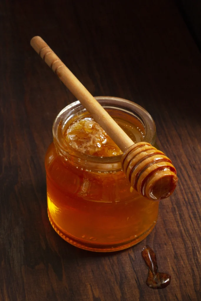 wooden honey dipper top honey jar